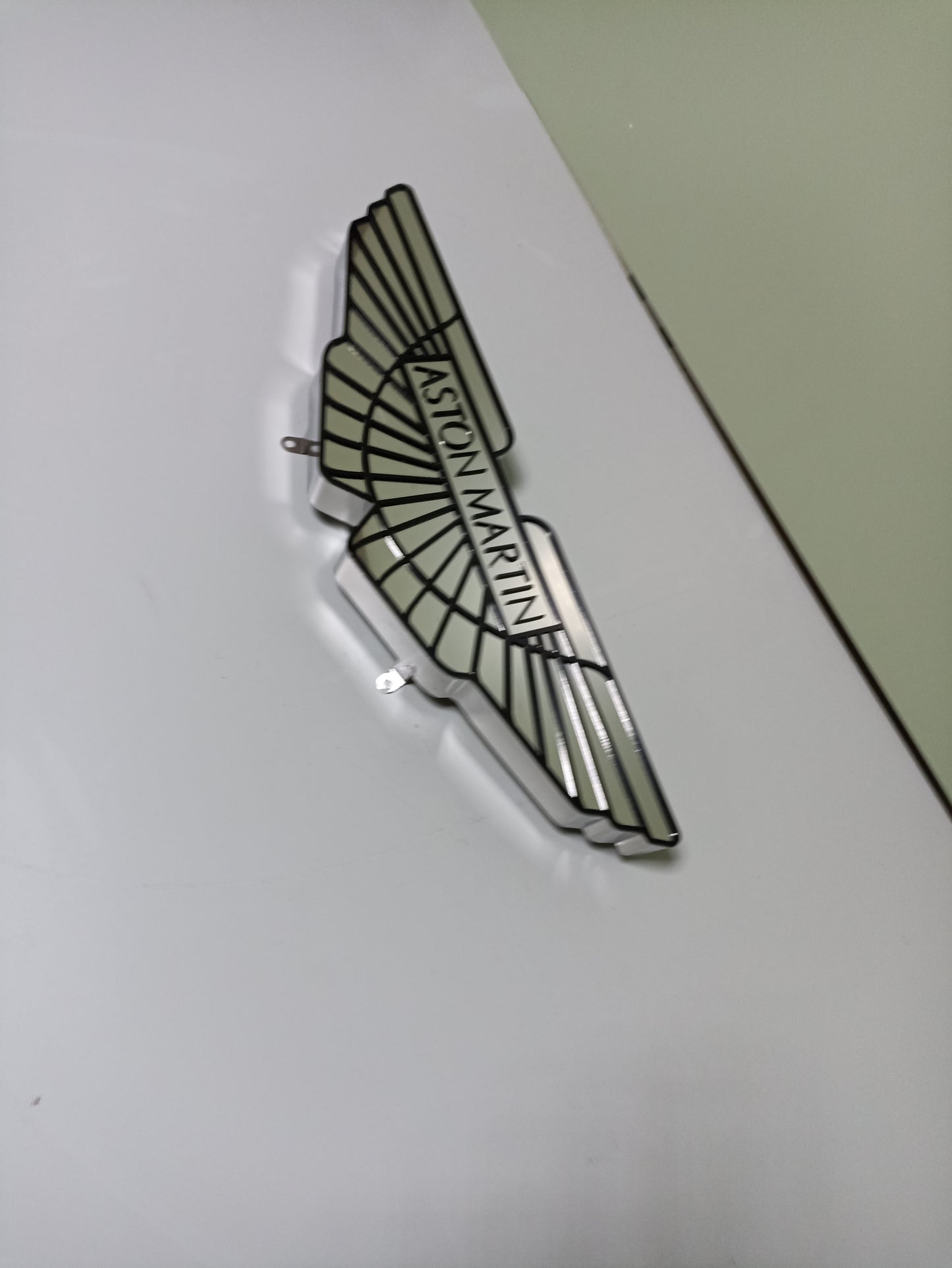 Elegant and Stylish Metal Aston Martin Sign: Exclusive Wall Decor for Car Enthusiasts