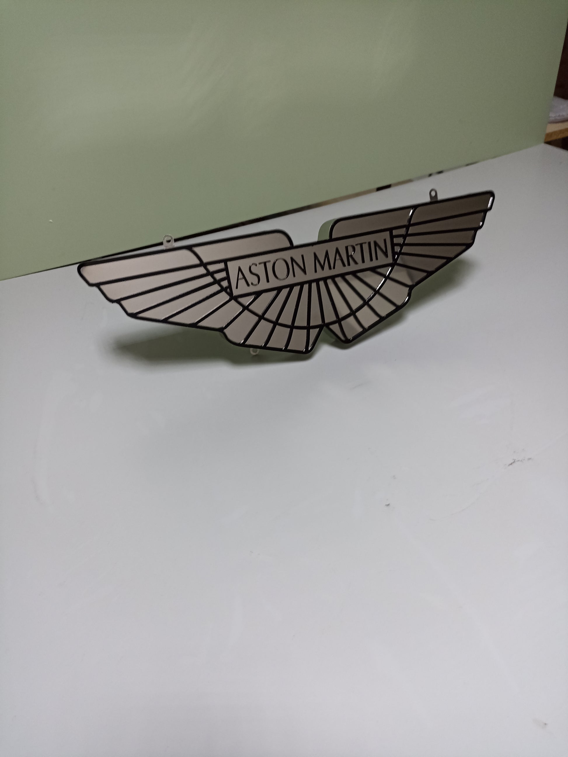 Elegant and Stylish Metal Aston Martin Sign: Exclusive Wall Decor for Car Enthusiasts