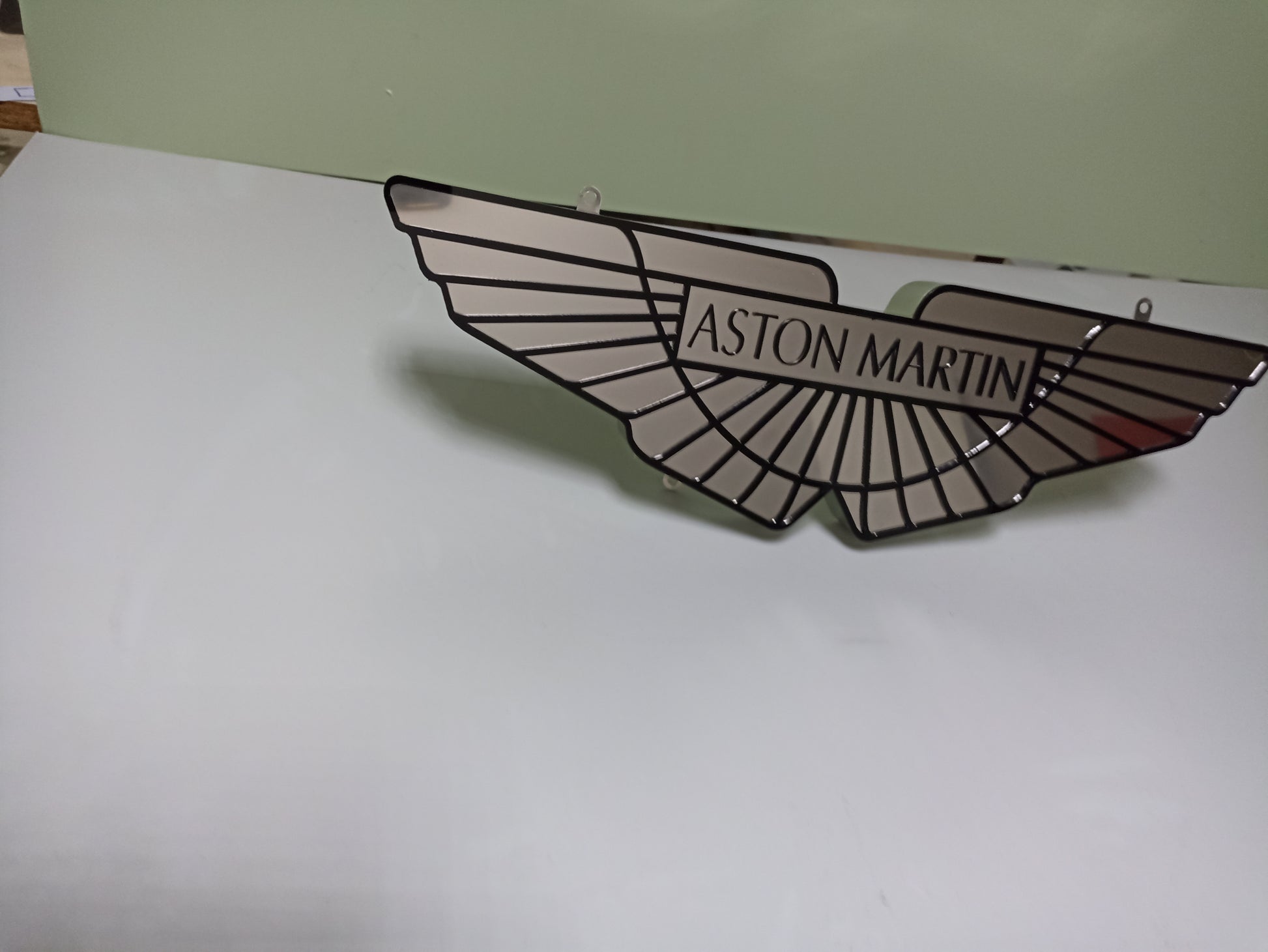 Elegant and Stylish Metal Aston Martin Sign: Exclusive Wall Decor for Car Enthusiasts